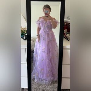 Lavender poofy dress with embroidered flowers and leg slit and corset tie back